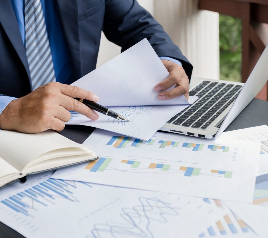 businessman-hand-holding-pen-analysis-the-graph-with-laptop-at-the-home-office.jpg businessman-hand-holding-pen-analysis-the-graph-with-laptop-at-the-home-office.jpg